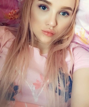 Оля